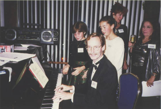 1995_dec_10_drew_at_the_piano_fans.jpg